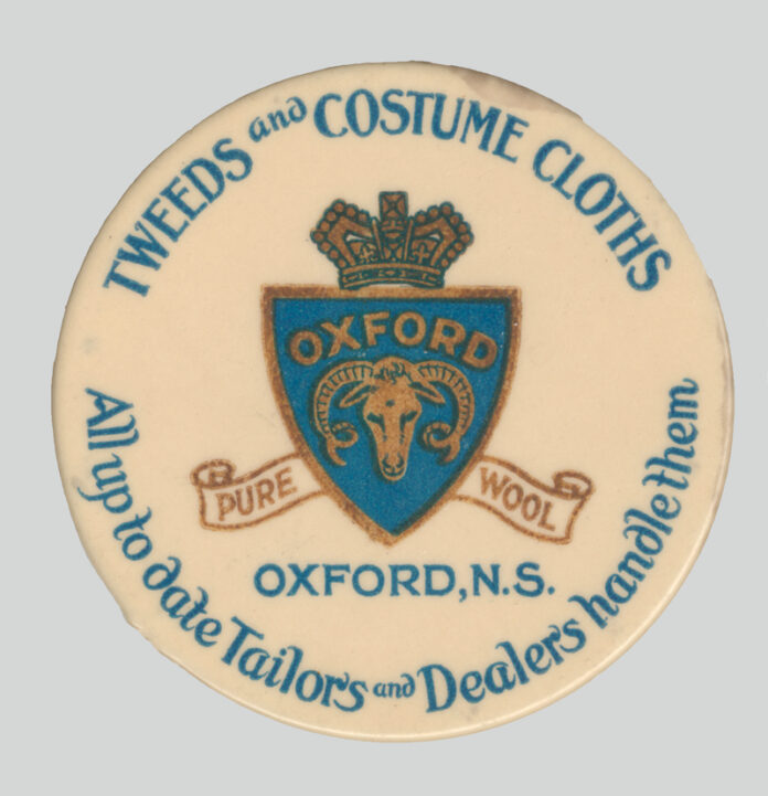 A pocket mirror / advertising badge for the Oxford Woollen Mills