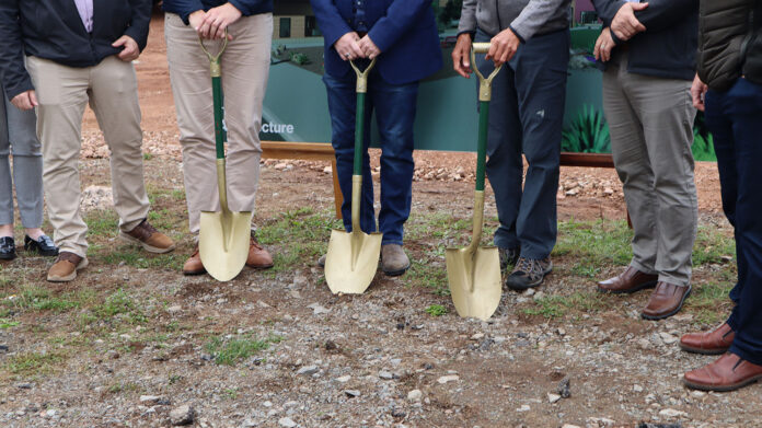 Golden shovels at the funding announcement for the Oxford Community Centre