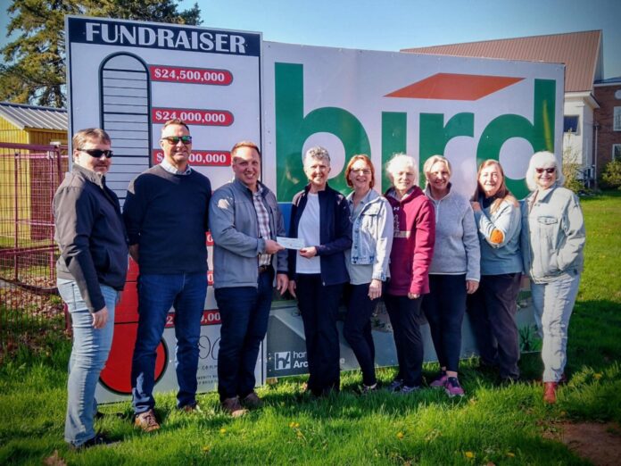 The Oxford & Area Community Centre Committee receives a cheque from the NS Walks - Oxford Group